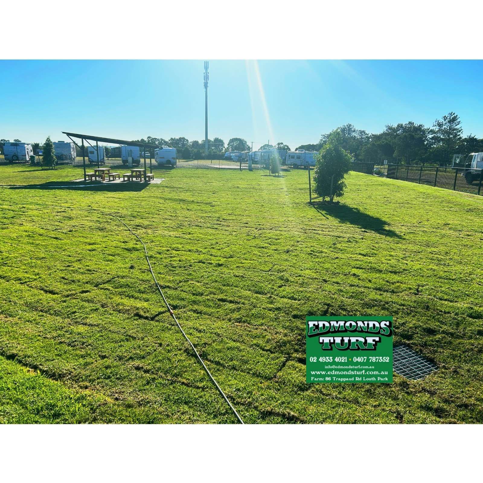 Sunny Grassy Field With a Small Pavilion, Trees — Edmonds Turf in Louth Park, NSW