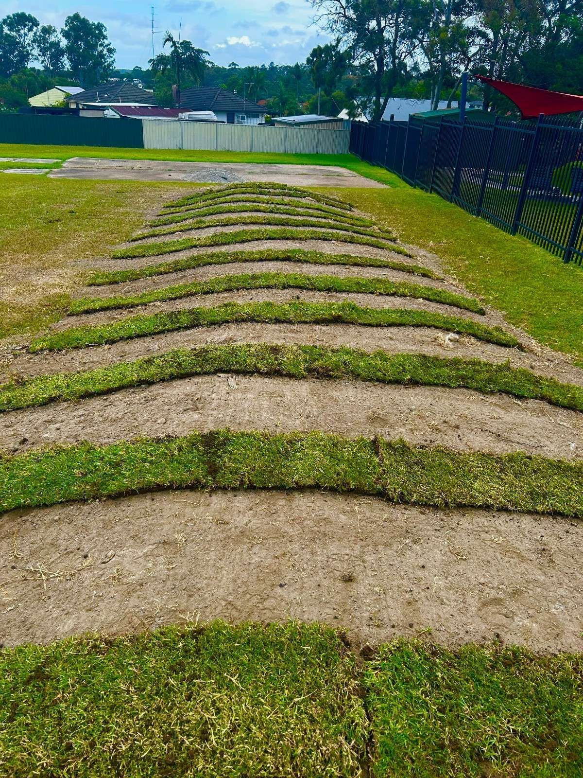 Curved Gravel Path Across a Grassy Field — Edmonds Turf in Louth Park, NSW