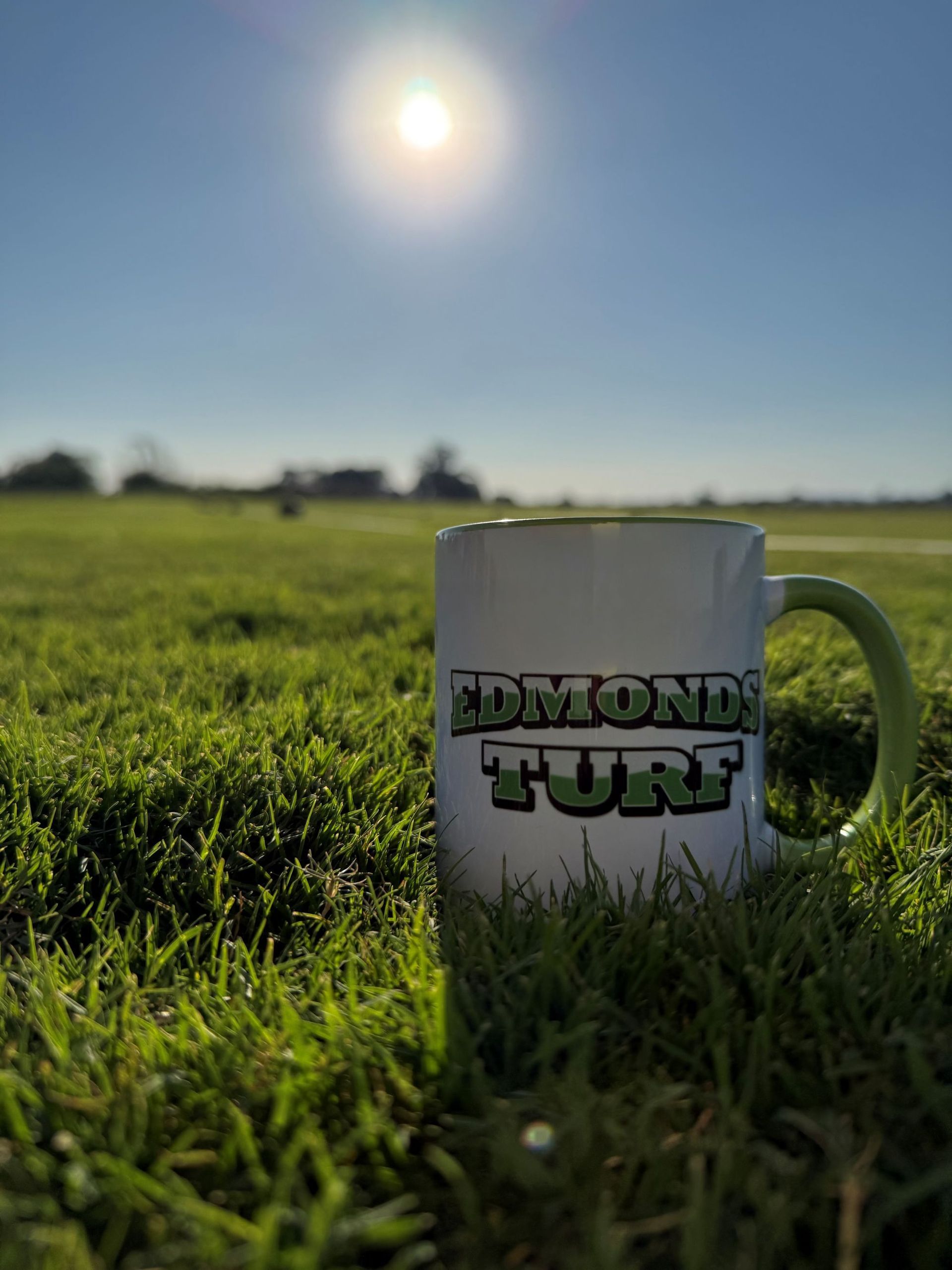 Edmond Turf Logo Marker in Green Grass — Edmonds Turf in Louth Park, NSW