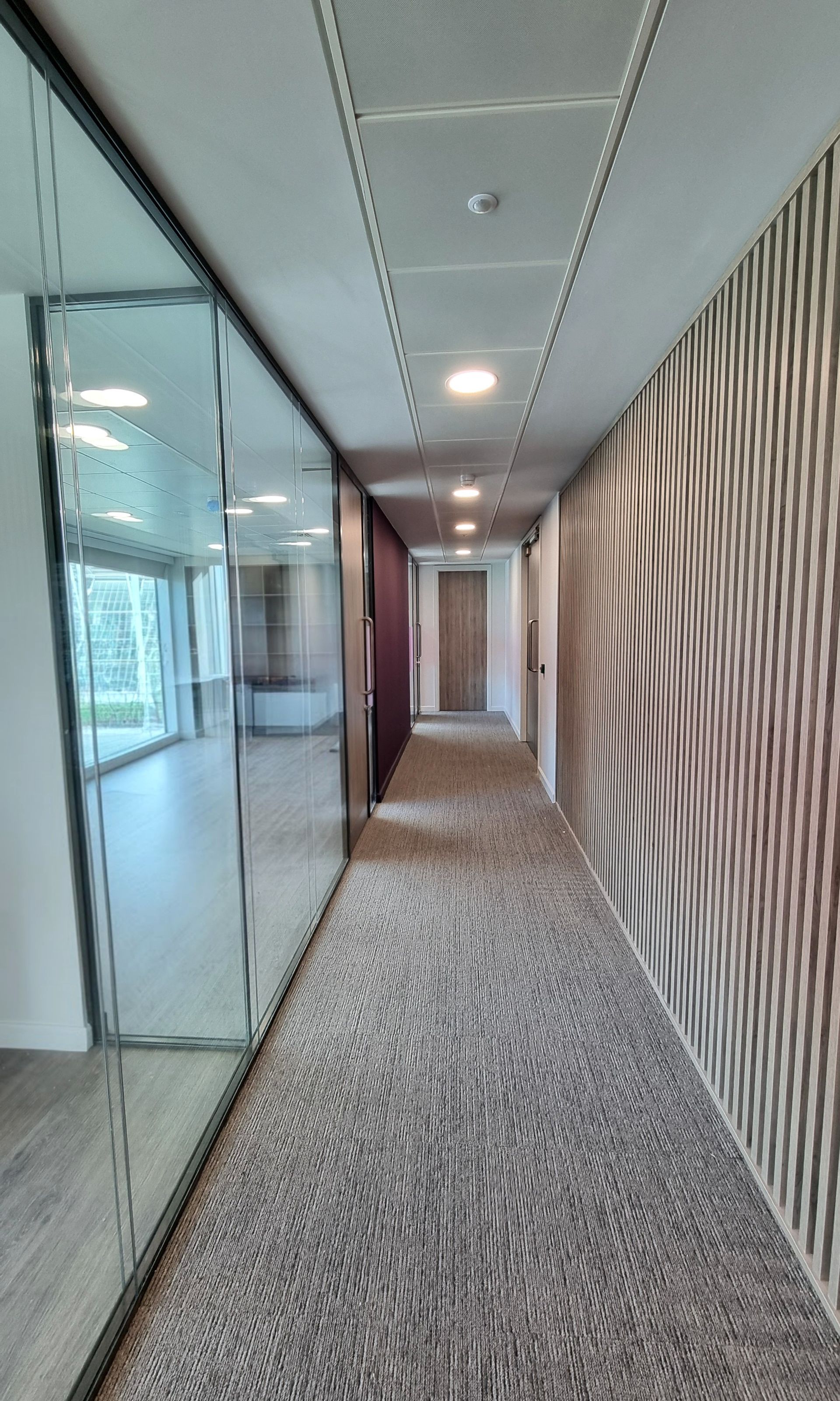 Double Glazed Frameless Office Glass Partition including Timber Doors for a commercial project in Newcastle upon Tyne