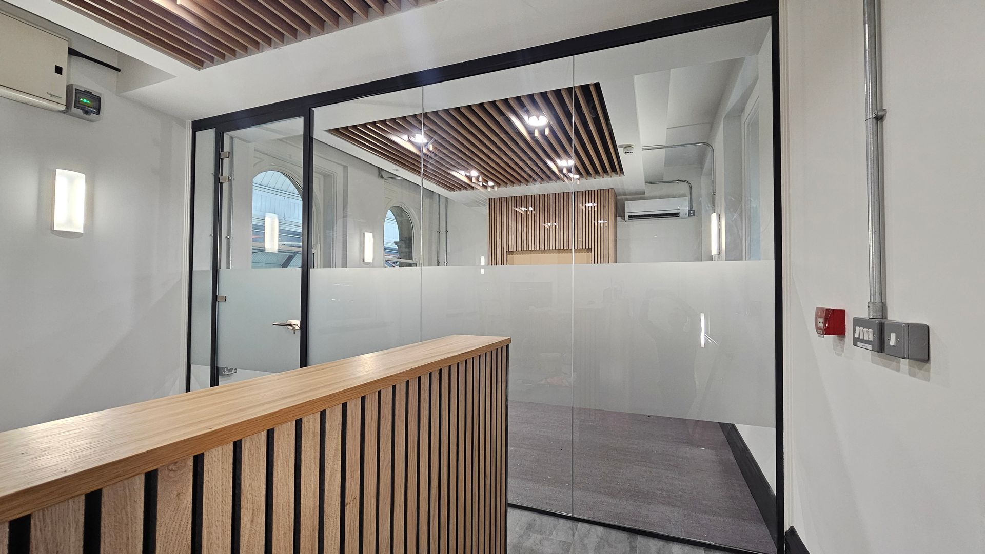 Single glazed office glass partition with slimline door frame and glass door installed in Newcastle city centre