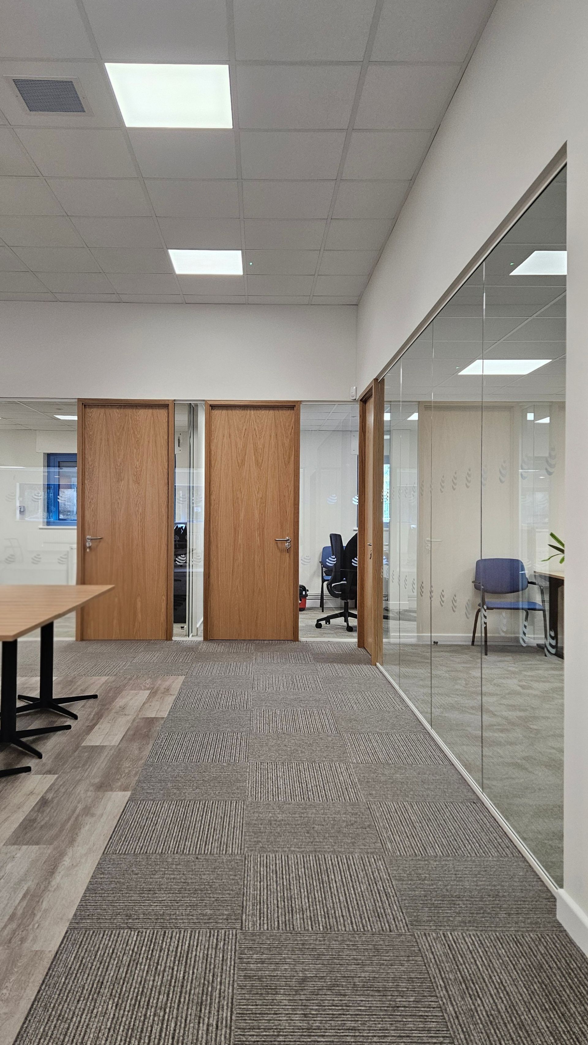 Frameless single glazed office partitioning system installed by Clear Divide in Northumberland