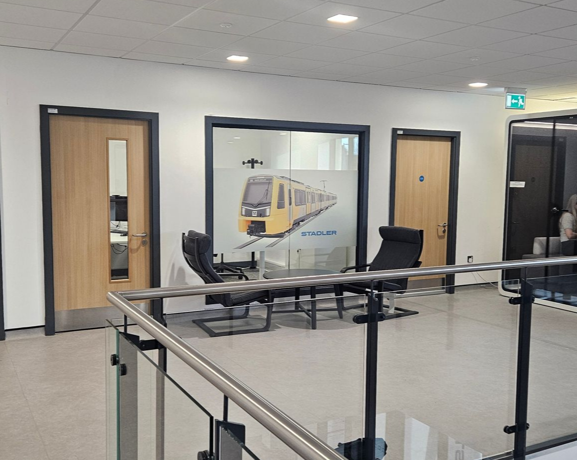 Fire rated aluminium glass screen installed by Clear Divide at Tyne & Wear Metro Gosforth