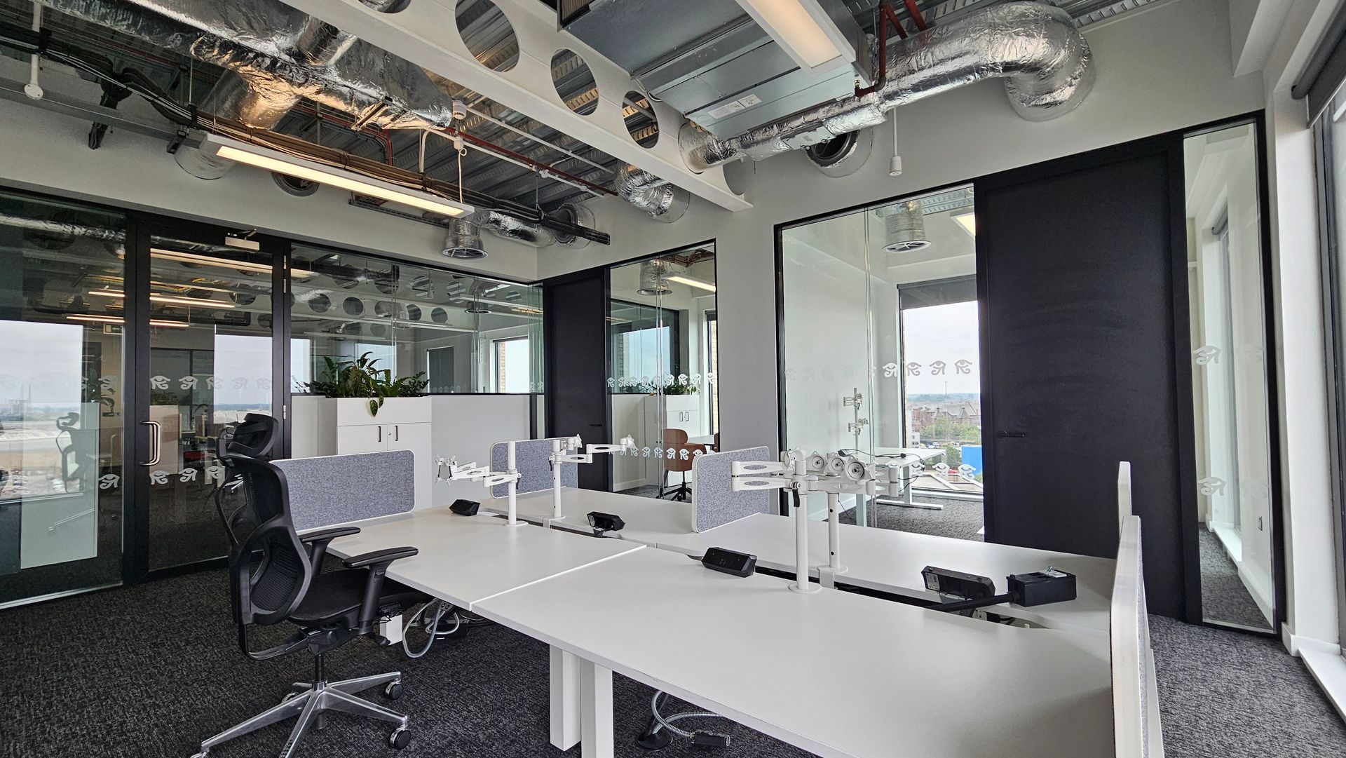 Acoustic glass partition creating private managers offices in Middlesbrough