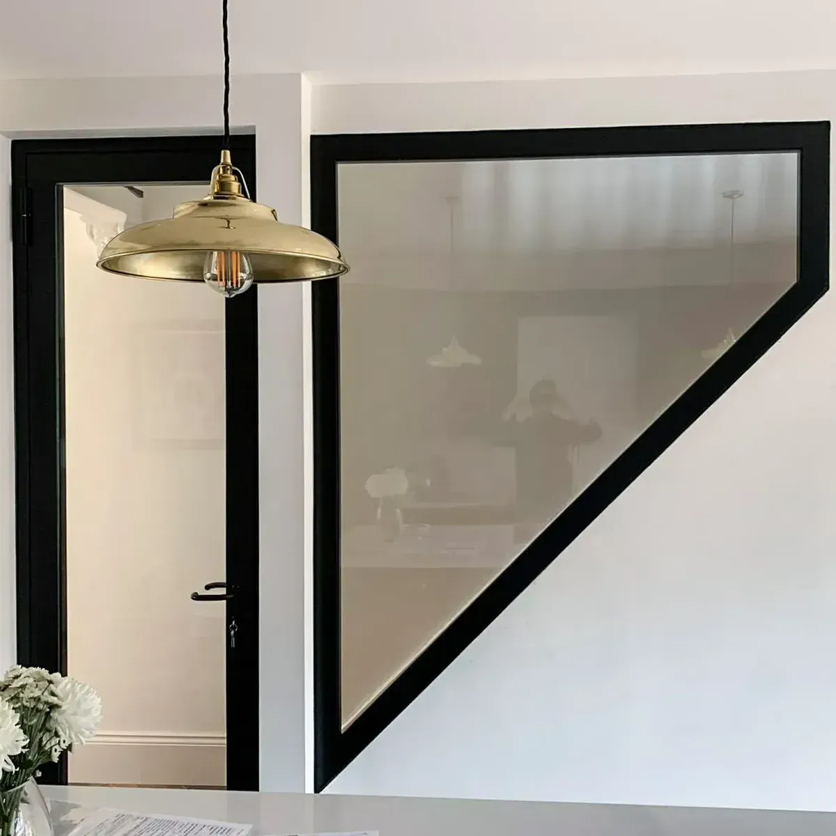 Steel Fire Screen and Steel Fire-Rated Glass Door in a Residential Setting