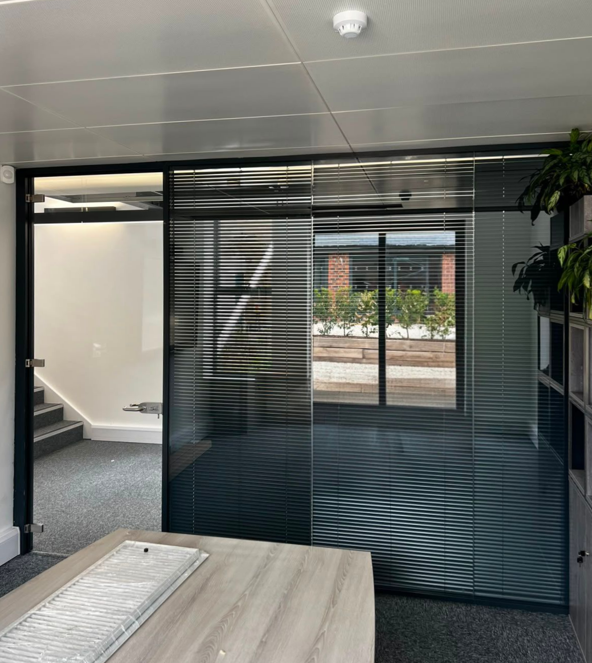 Acoustic double glazed office partition installation by Clear Divide