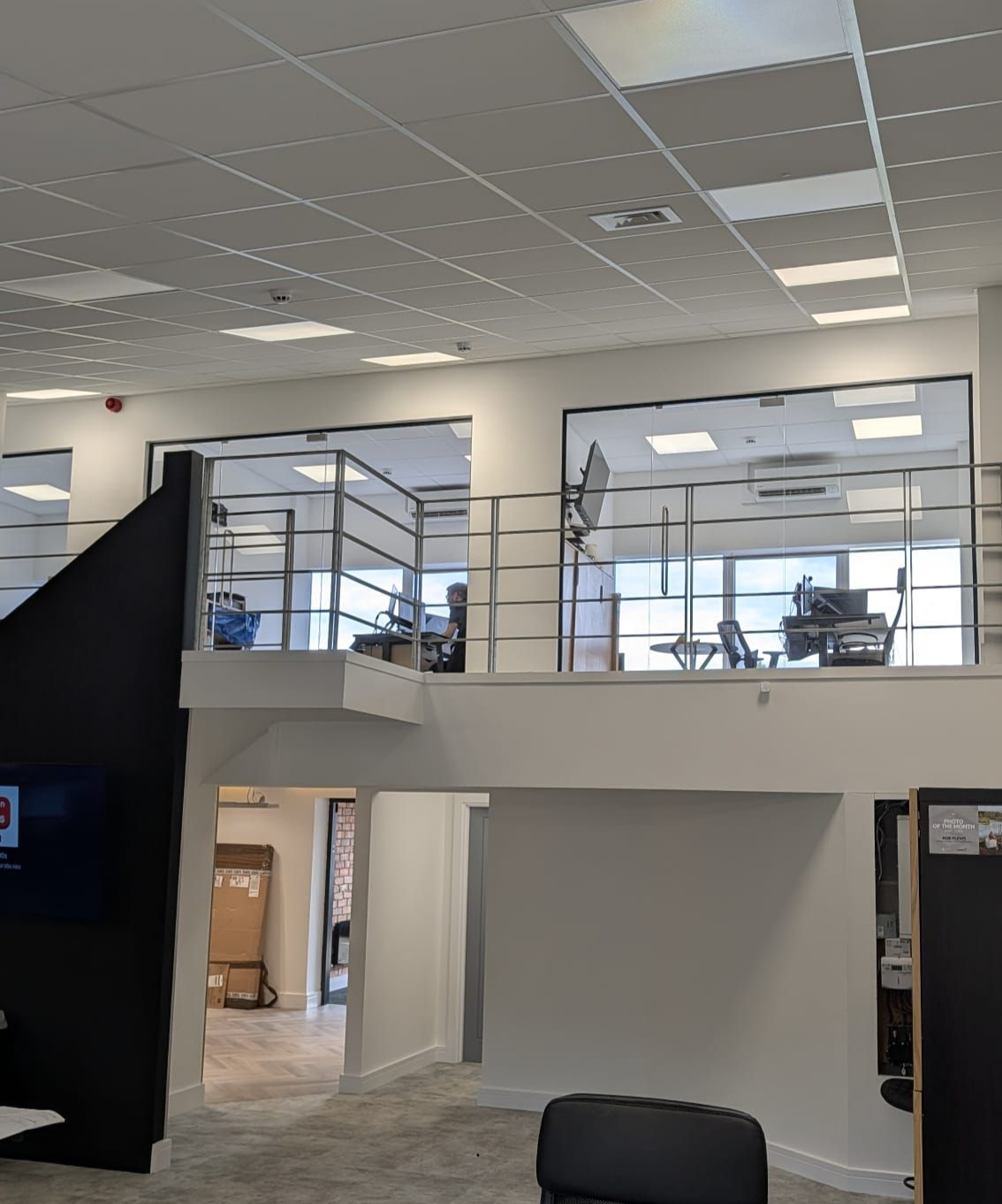 Frameless glass partitions installed on a mezzanine in Gateshead