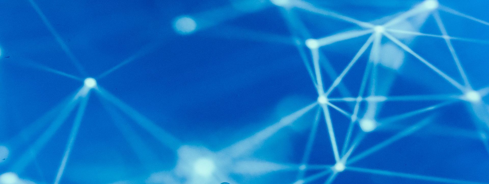 a blue background with white lines and dots