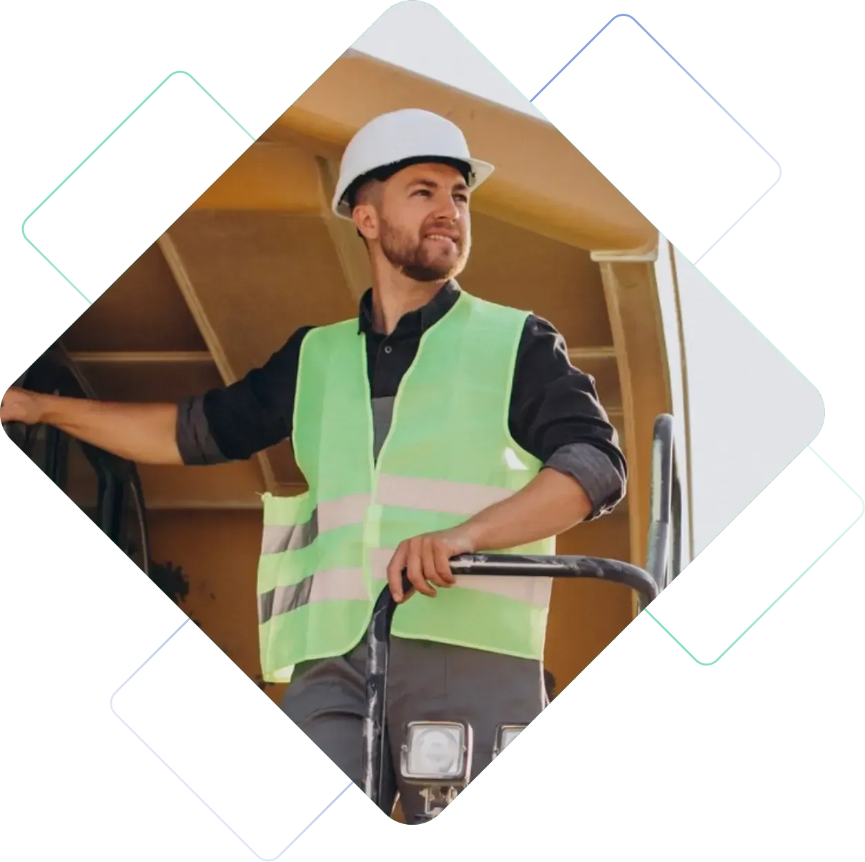 Operário com capacete branco e colete de segurança fluorescente operando máquinas em um canteiro de obras.