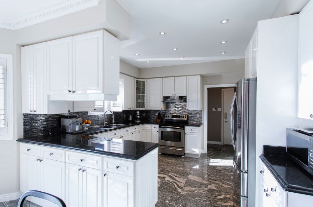 Kitchen with Cabinets and Countertops — NBM Constructions in Canberra