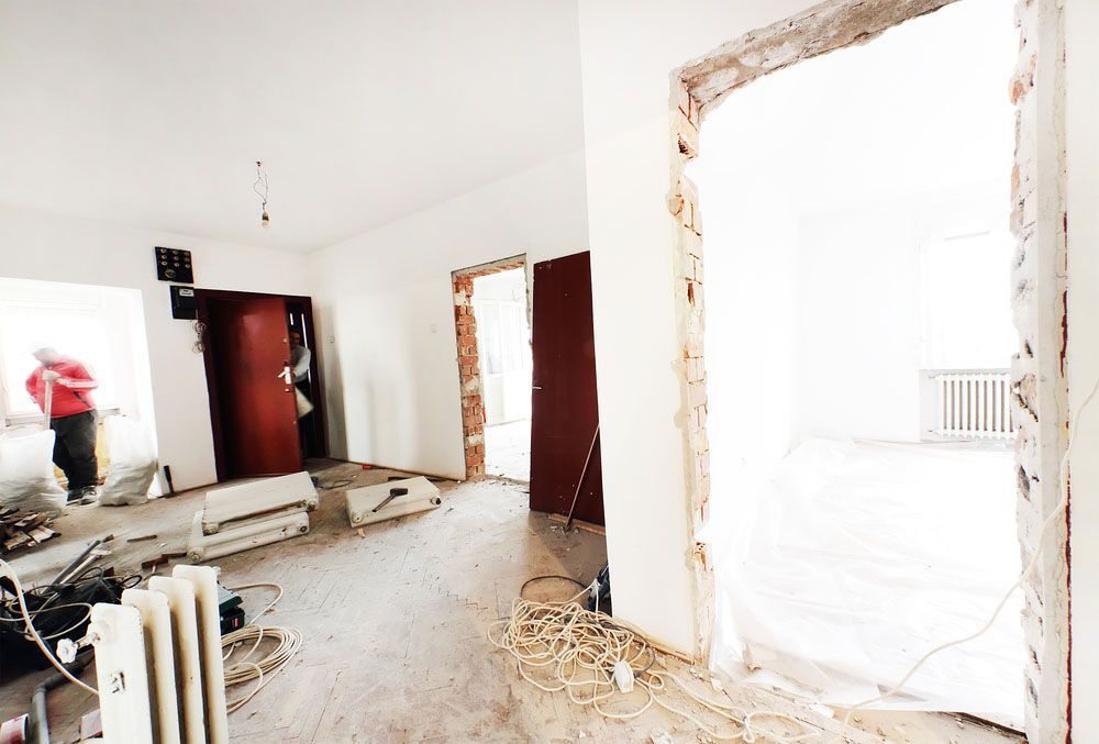 Man Entering Room Under Construction — NBM Constructions