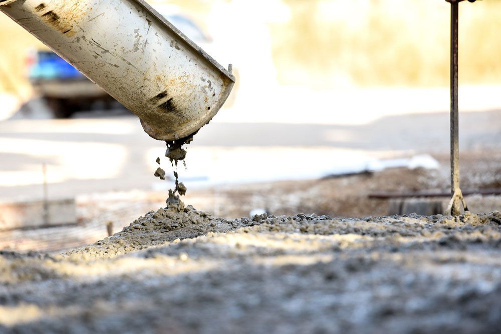 Pouring Concrete into the Ground — NBM Constructions
