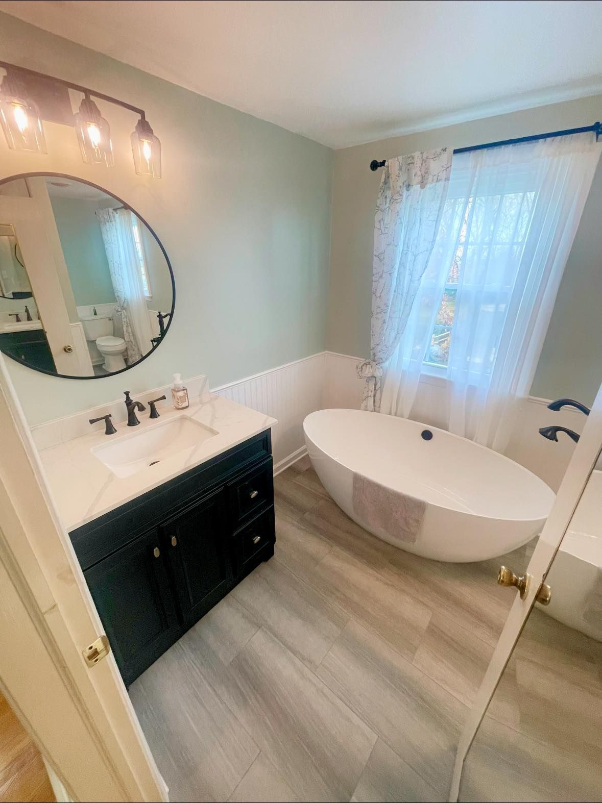 New Bathroom with Tub, Vanity Soaking Tub and Flooring