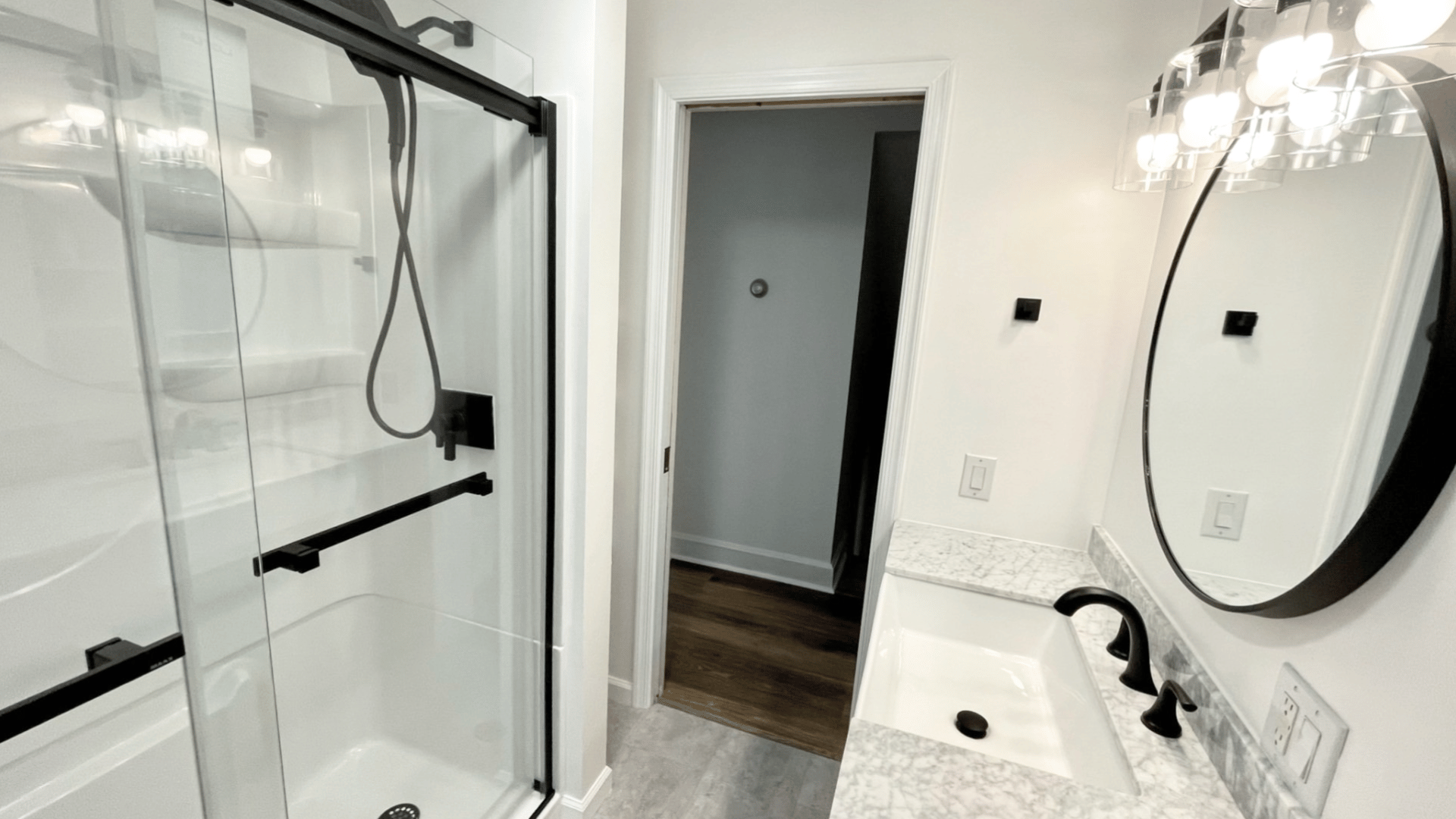Full Bathroom Remodel with New Shower, Vanity, Lights and Mirror.