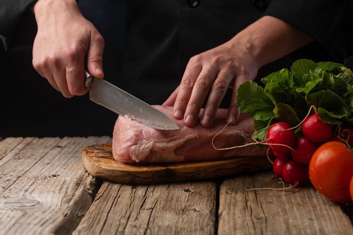 Cutting a pork using a knife