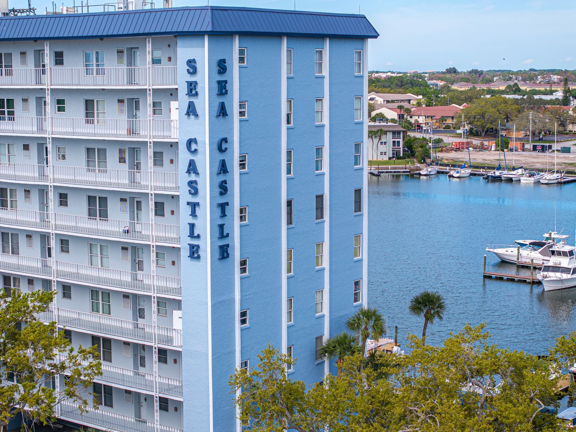A blue building with the word sea castle on it