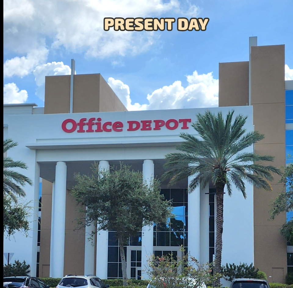 An office depot building with palm trees in front of it