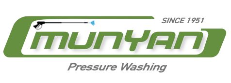 A green and white logo for munyan pressure washing