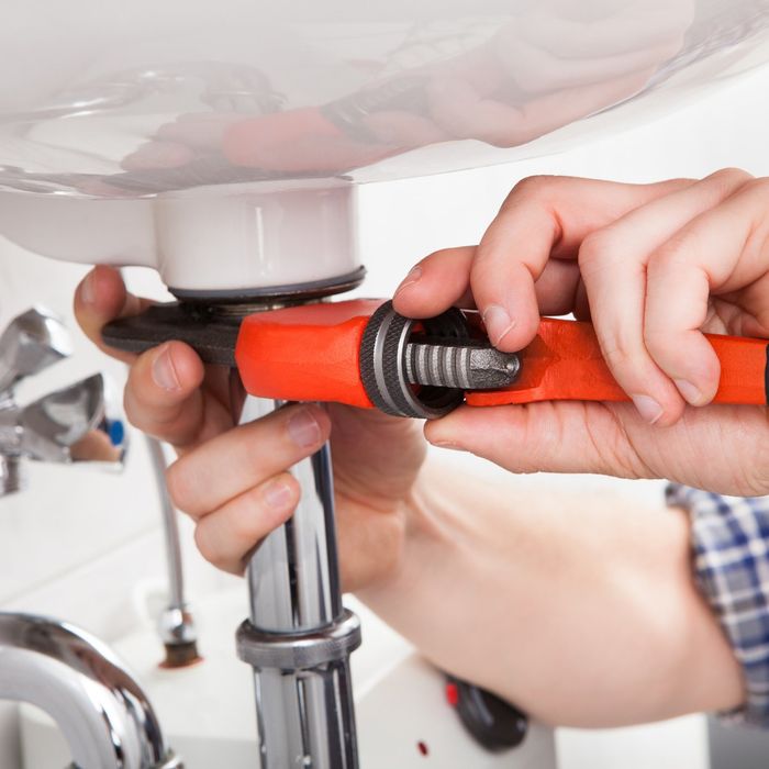 Plumber Fixing a Sink — Sydney, NSW — Flush ‘N’ Go Plumbing Plumber Fixing a Sink — Sydney, NSW — Flush ‘N’ Go Plumbing