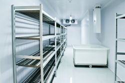There are a lot of shelves in this room. There are a lot of shelves in this room.