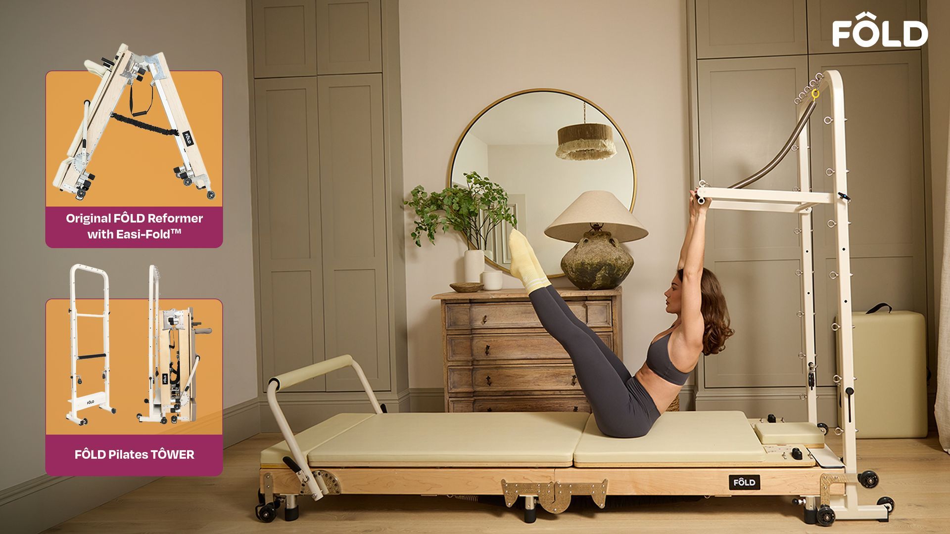 Person using a white Pilates reformer in a beige studio, exercising with legs raised near a mirror.