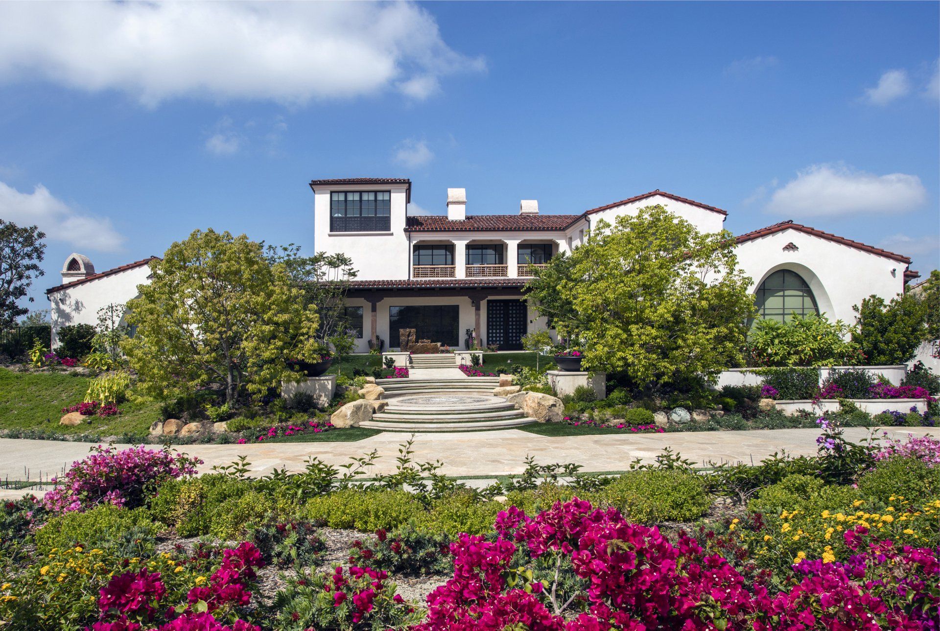Exterior of a Santa Barbara style home in Irvine designed by Oatman Architects