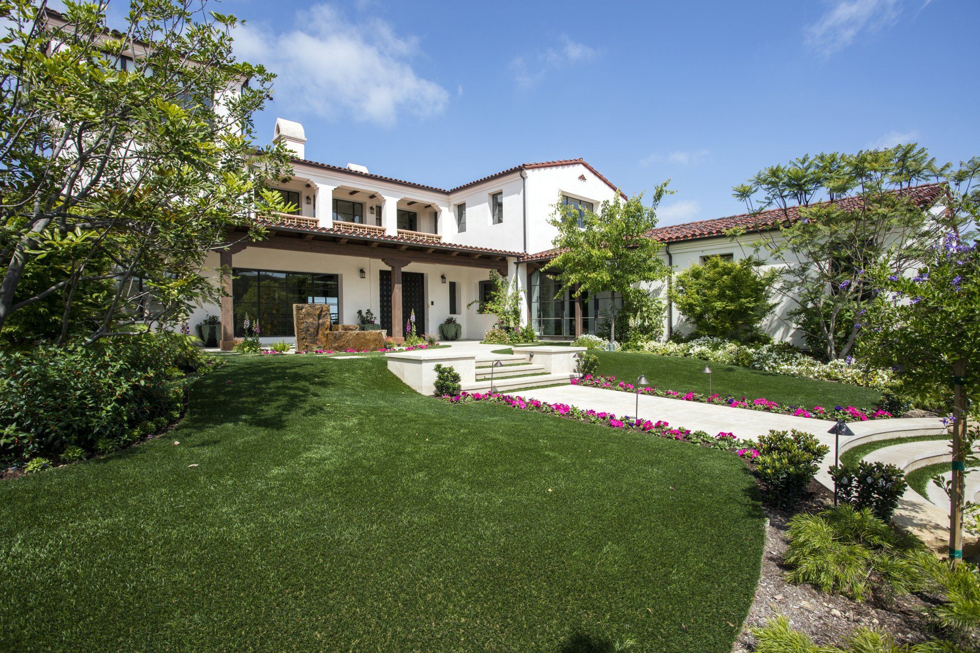 Exterior of a Santa Barbara style home in Irvine designed by Oatman Architects