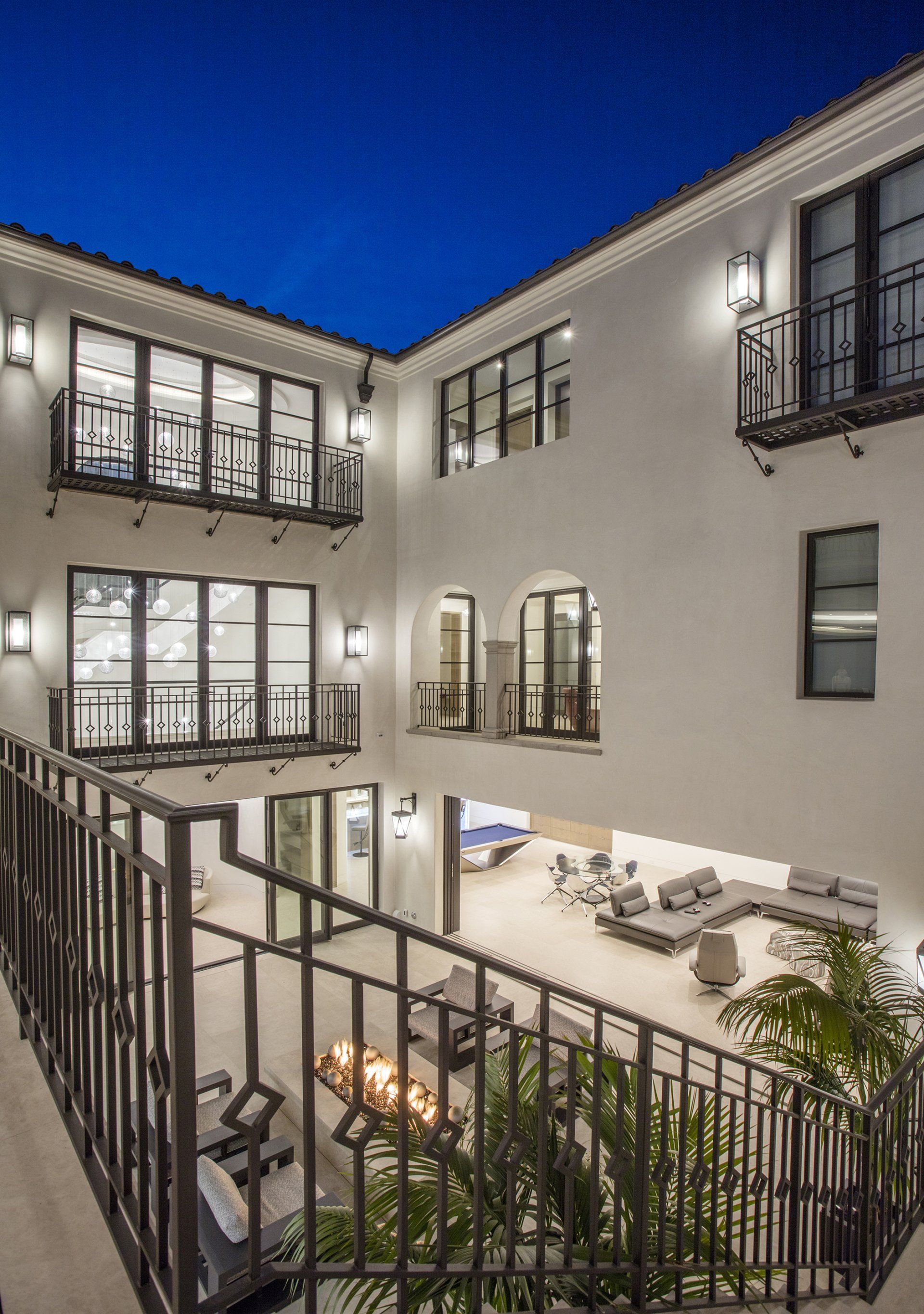 Contemporary Spanish Revival house in Corona Del Mar, CA designed by Homer Oatman