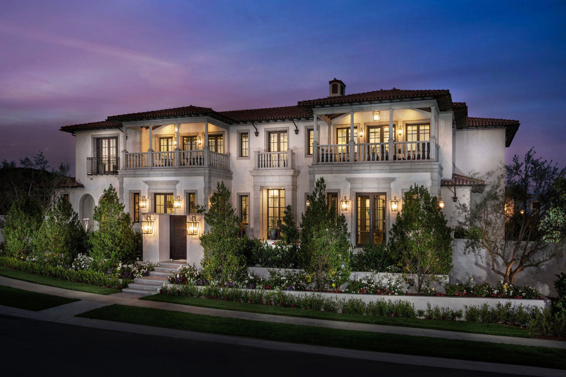 Exterior of a formal Italian style home in Crystal Cove designed by Oatman Architects