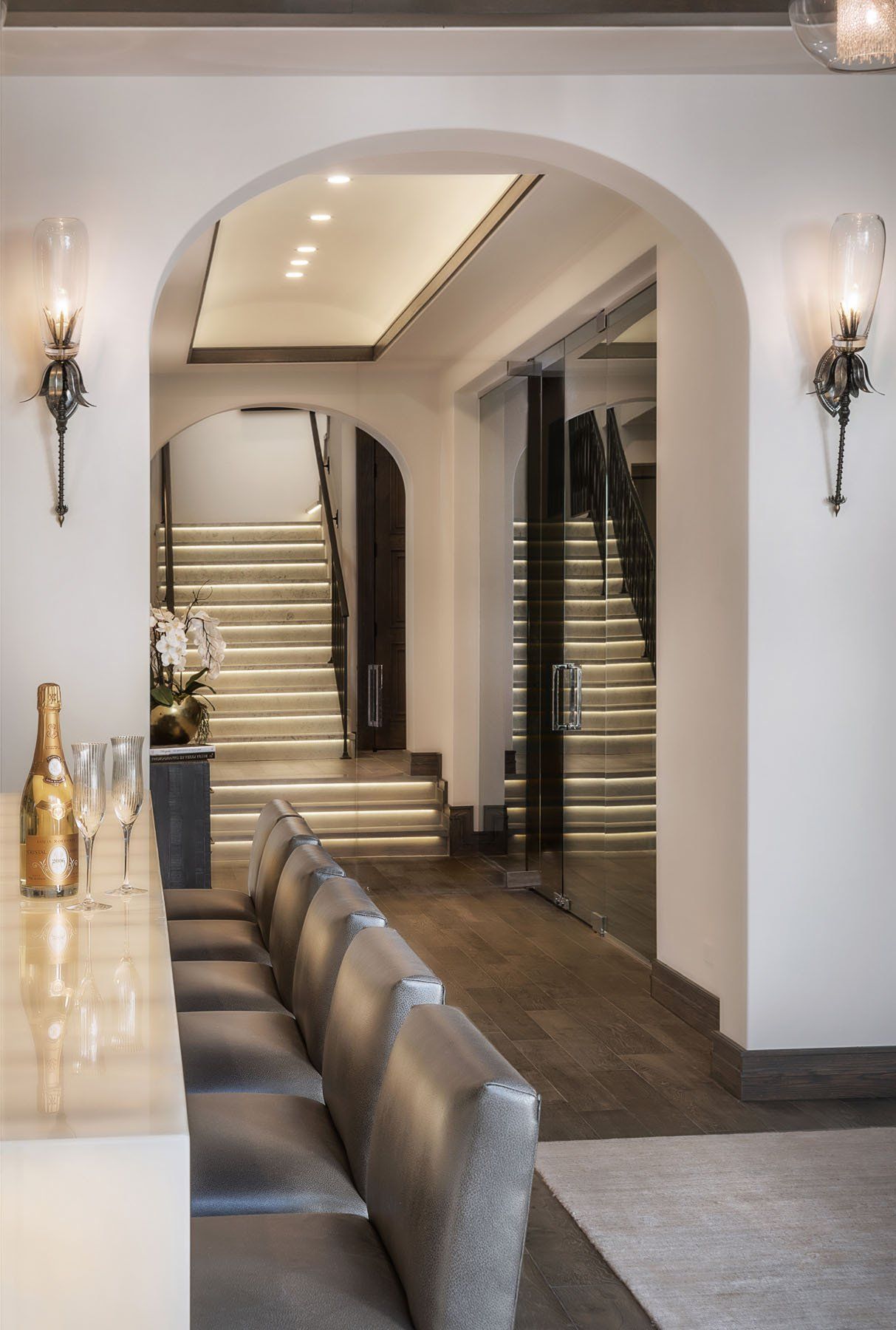Dining room in a formal Italian style home in Crystal Cove designed by Oatman Architects