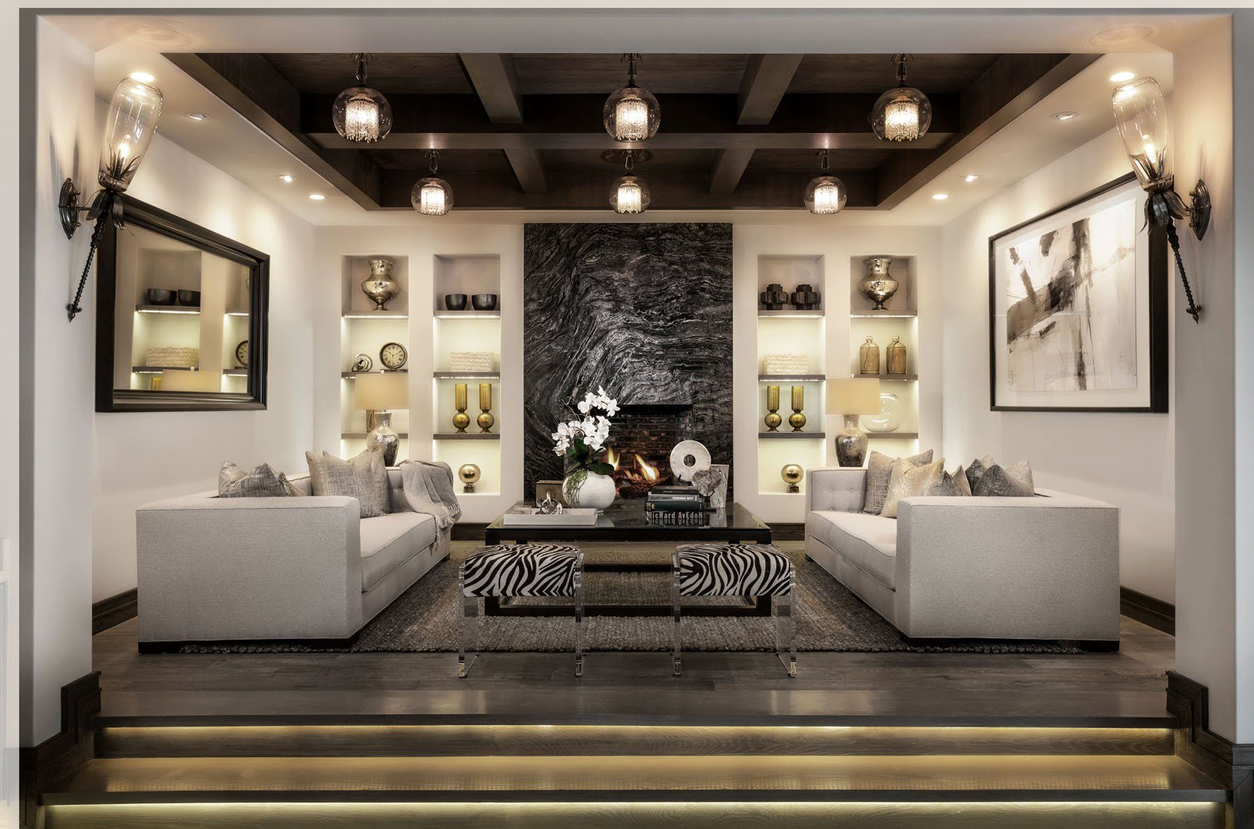 Living room in a formal Italian style home in Crystal Cove designed by Oatman Architects