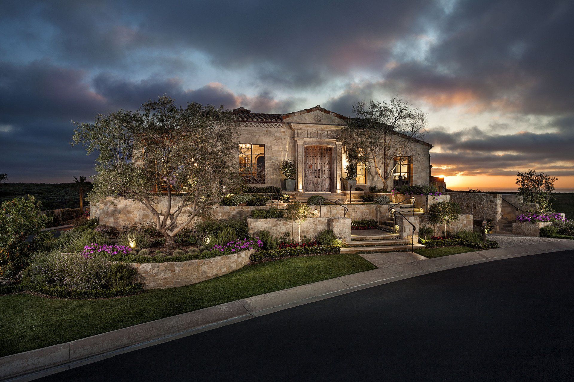 Exterior of a ROMANESQUE HILLTOP VILLA in Dana Point designed by Oatman Architects