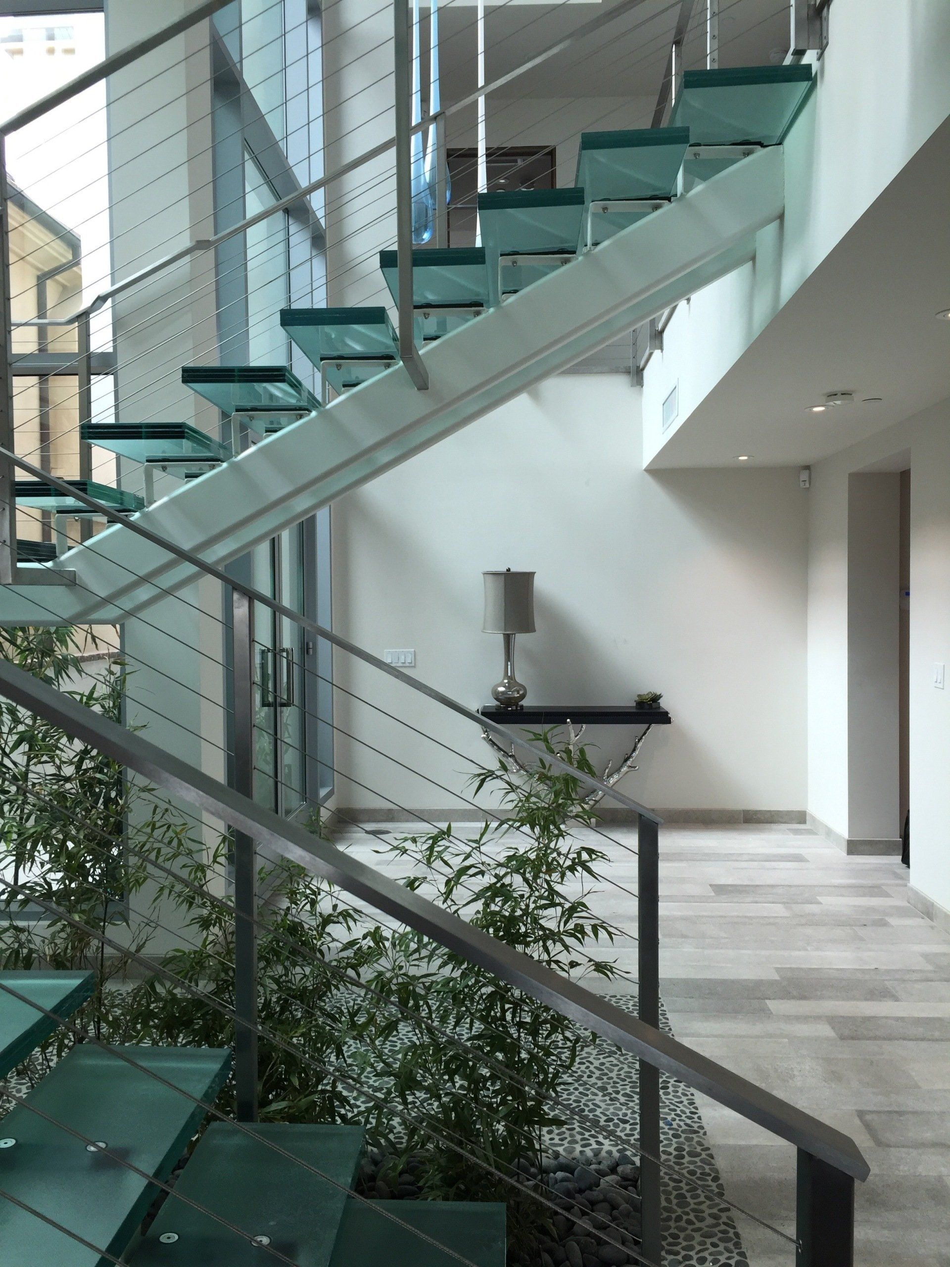Stairs of a Newport Beach contemporary beach house designed by Oatman Architects
