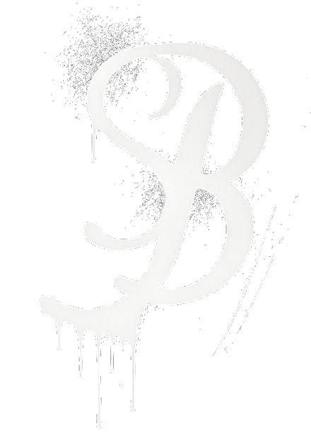 White spray-painted script letter 