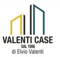 Logo “Valenti Case” in giallo, nero e verde acqua, con la scritta “Dal 1986 di Elvio Valenti”