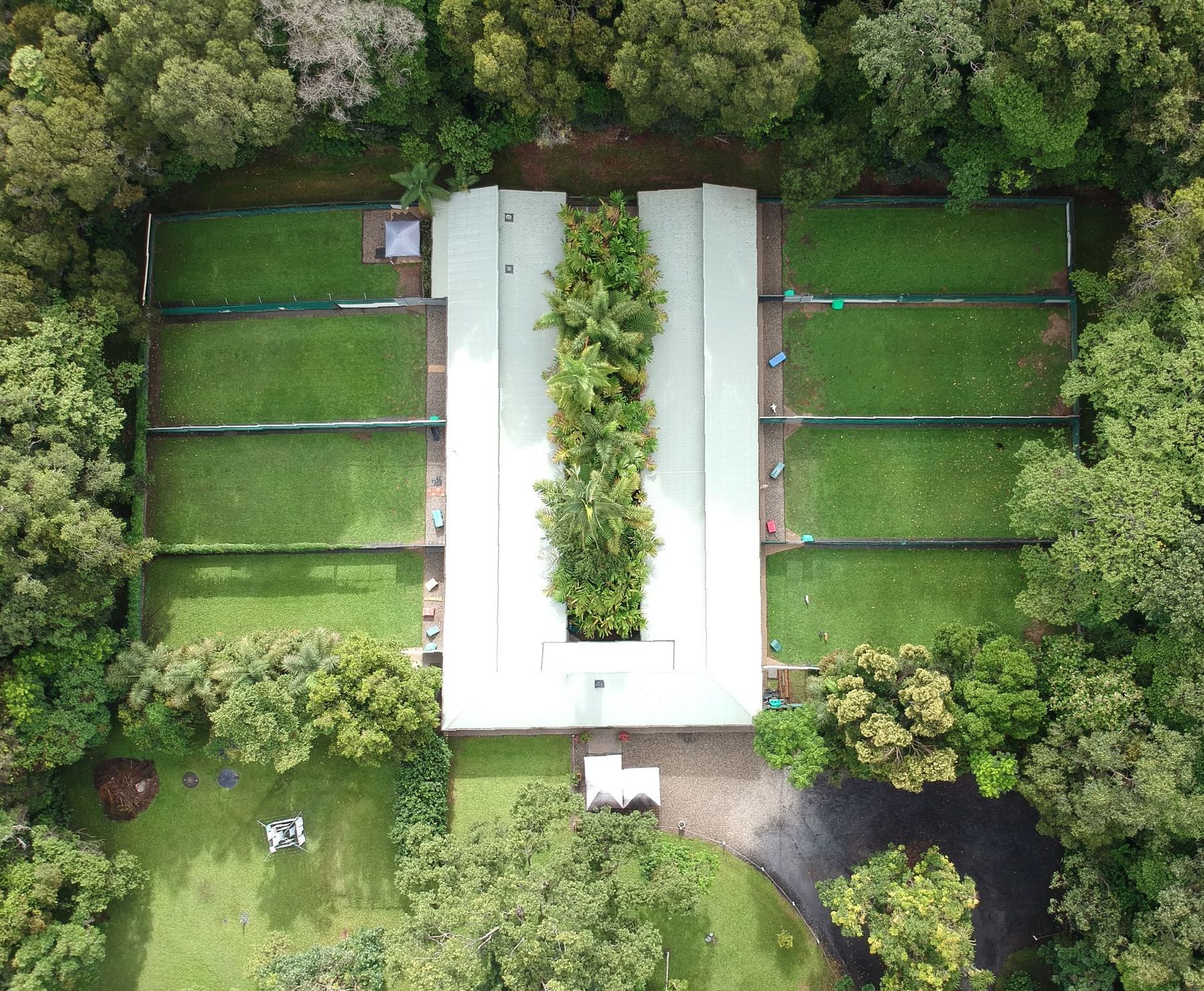 Overhead view of a building with a central green — Kuranda Pet Resort in Kuranda, QLD