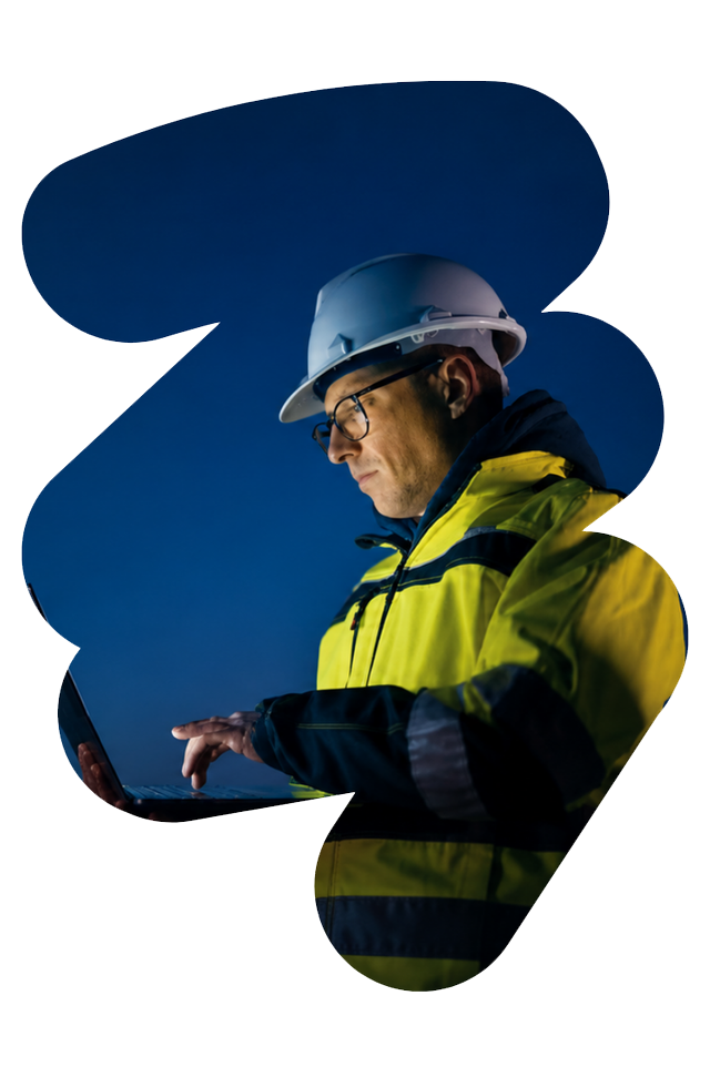 Construction worker in hard hat and yellow jacket, looking down against a blue background