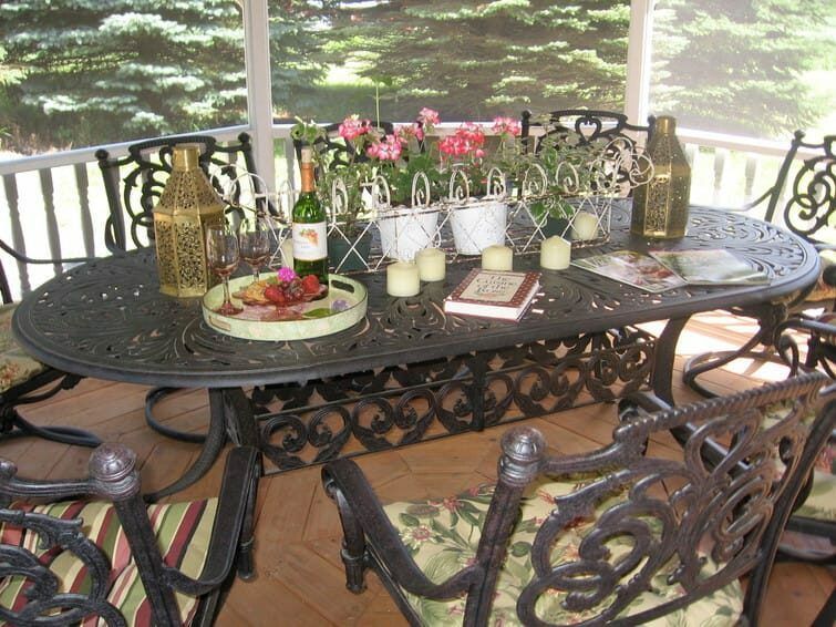 A table with a bottle of wine on it