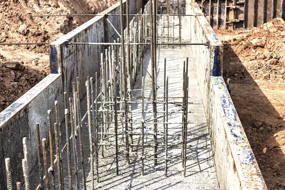 a building under construction with a lot of concrete