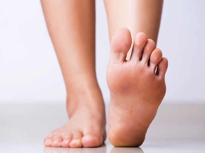 Closeup female foot pain