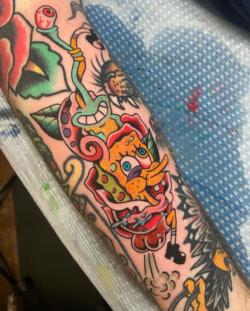 Colorful traditional-style tattoo on a forearm