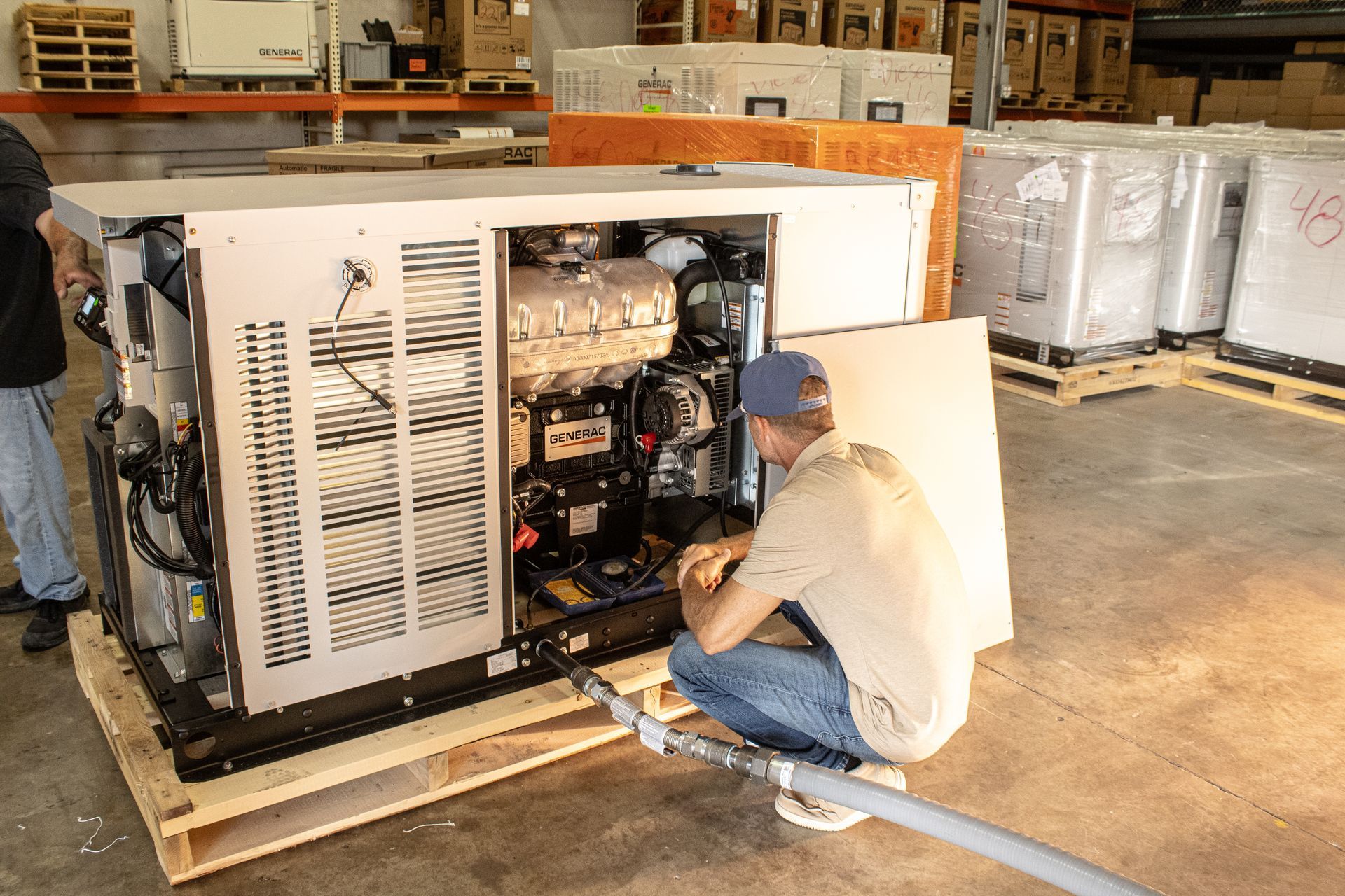 A Premier Generators of Texas technician learning about the mechanics and safety of home generators