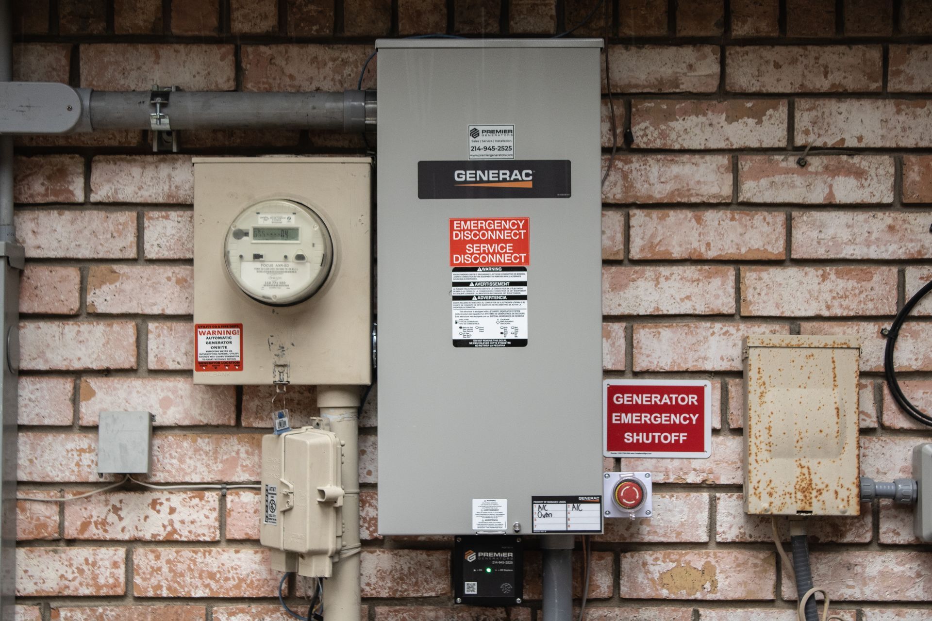 Generac® generator emergency shutoff and electrical meter installed on a home’s brick exterior