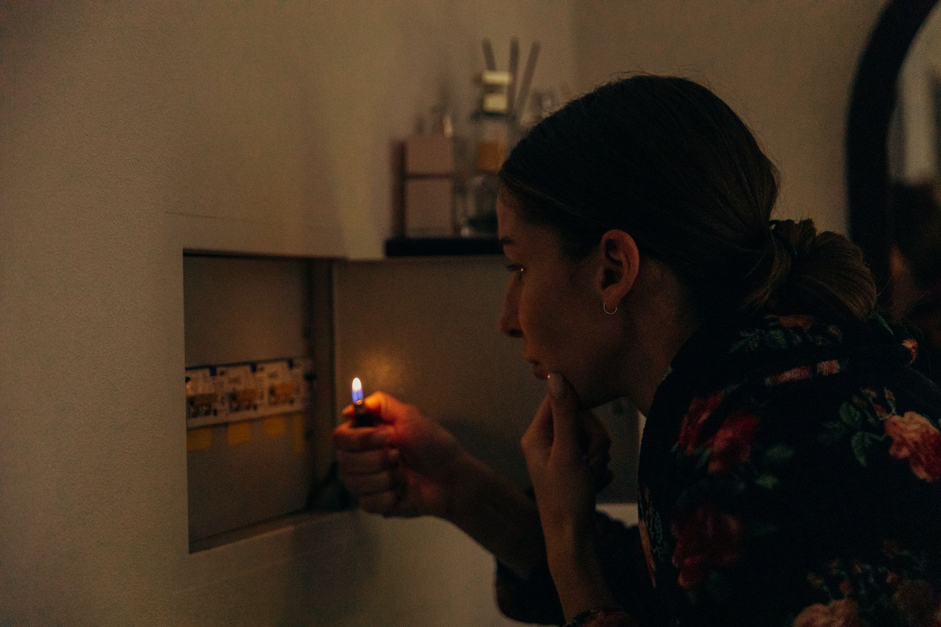 Person with a lighter, trying to understand why their power and generator won’t start