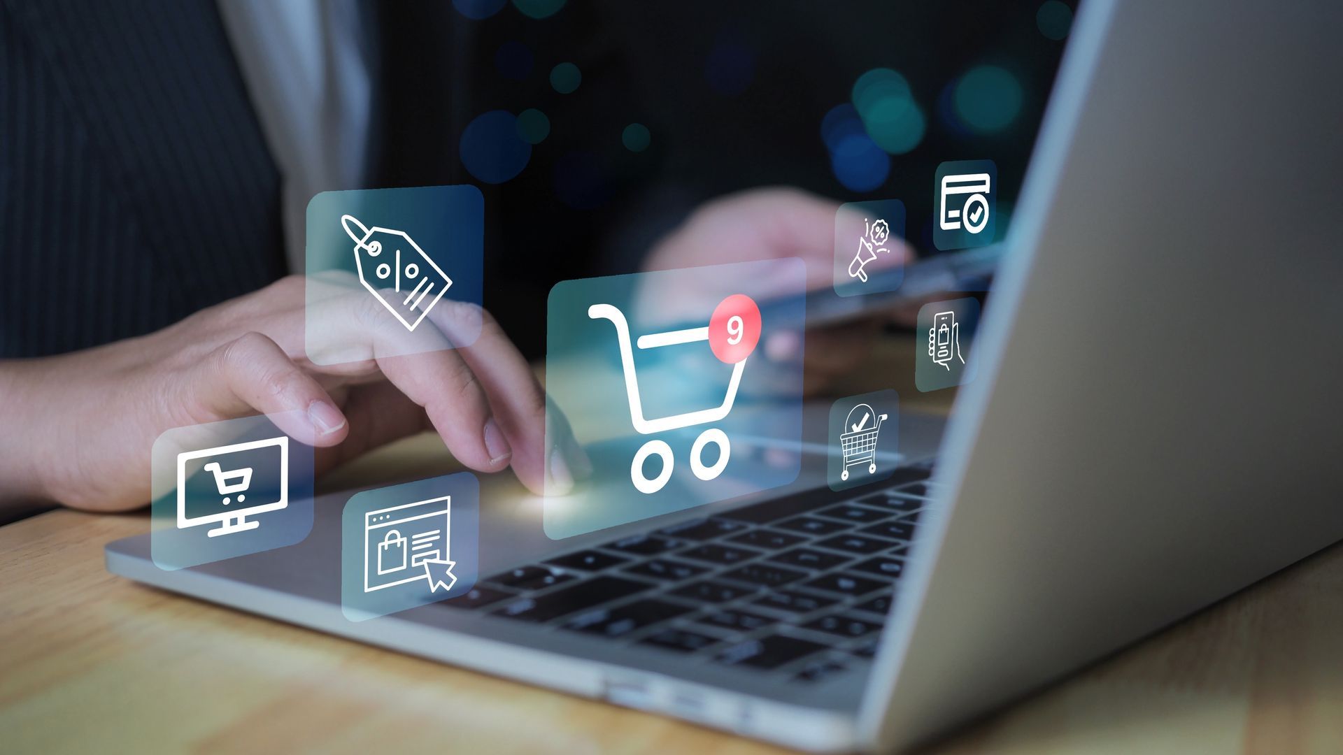 Person using a laptop, interacting with e-commerce icons, including a shopping cart.