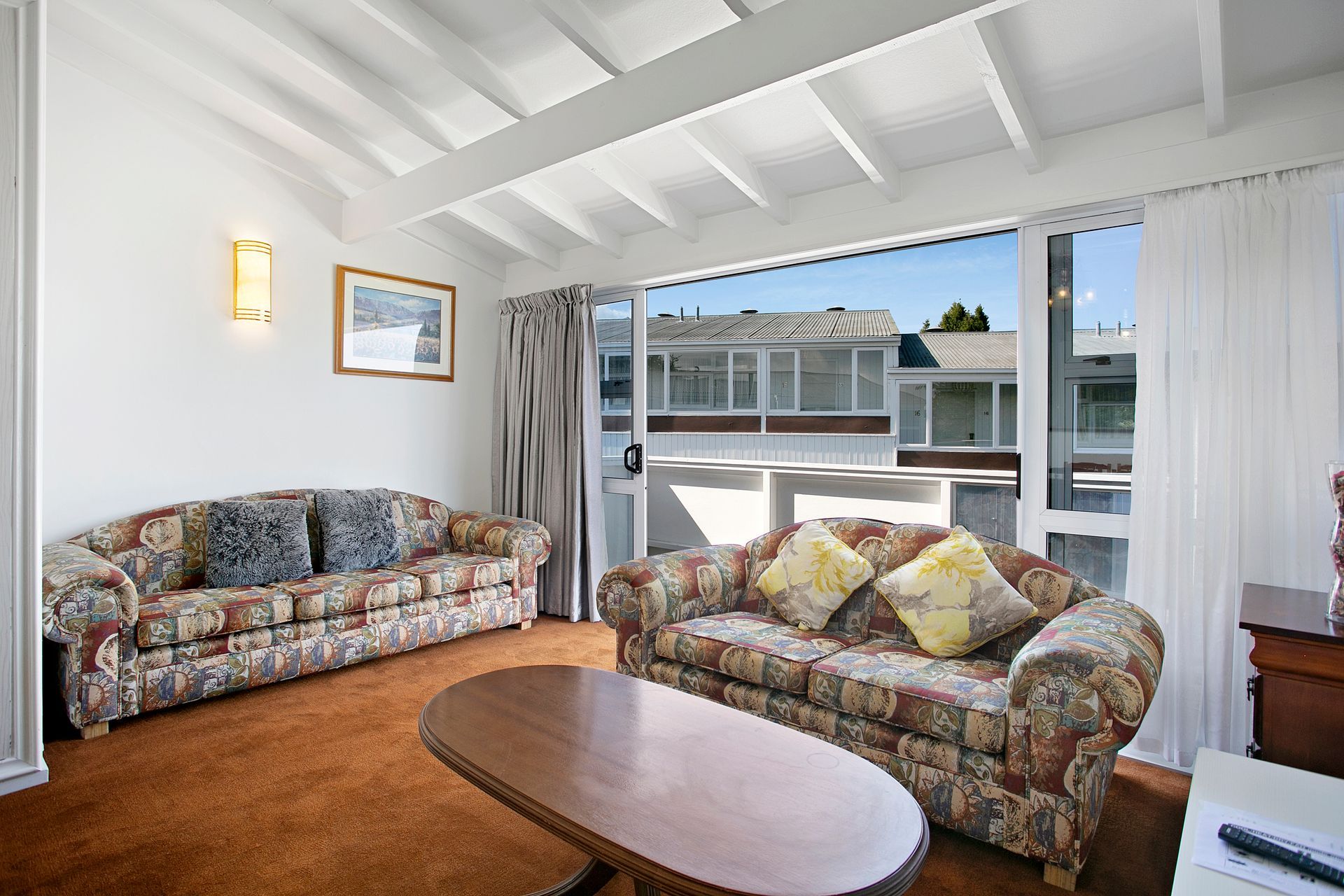 A living room with two couches and a coffee table