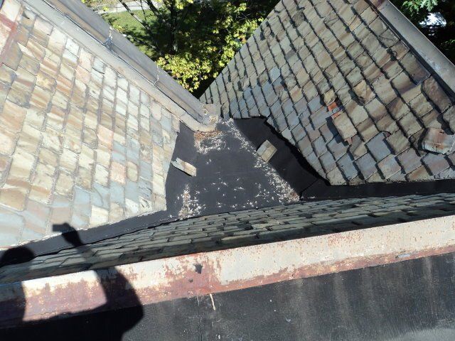 Before: Replace Valley, Flat Panel, & Parapet Wall Flashing