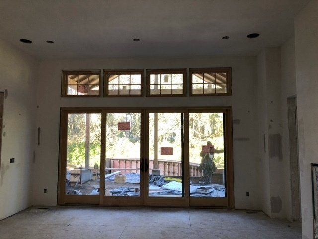 An empty room with a lot of windows and doors — Tukwila, WA — Bel-Red Windows & Doors