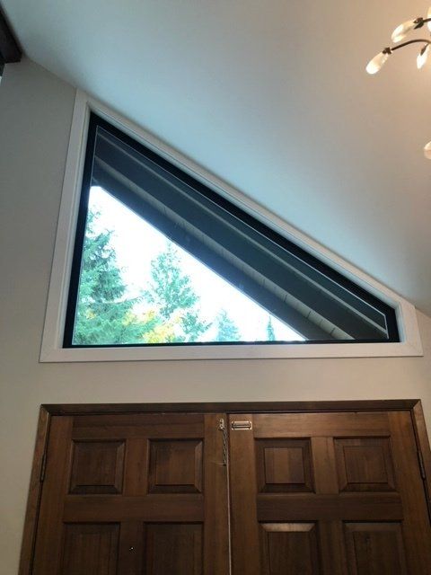 A door with a triangle window above it — Tukwila, WA — Bel-Red Windows & Doors