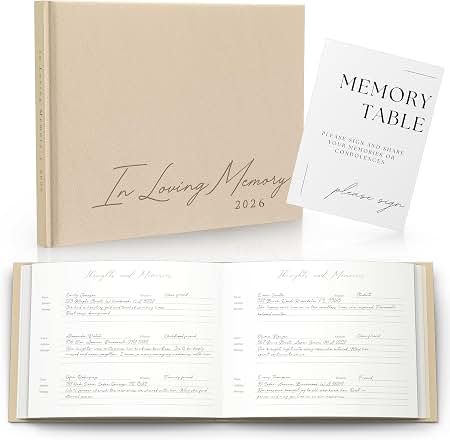 Three personalized photo books displayed open and closed on a white background